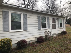 Front of a home with new windows