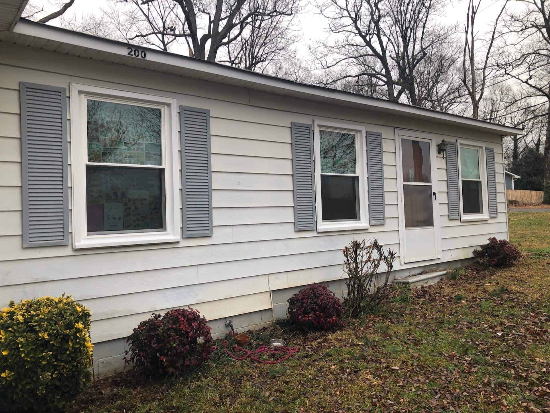 exterior of a home with SoftLite single hung windows