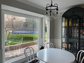 Dining room with a large SoftLite picture window