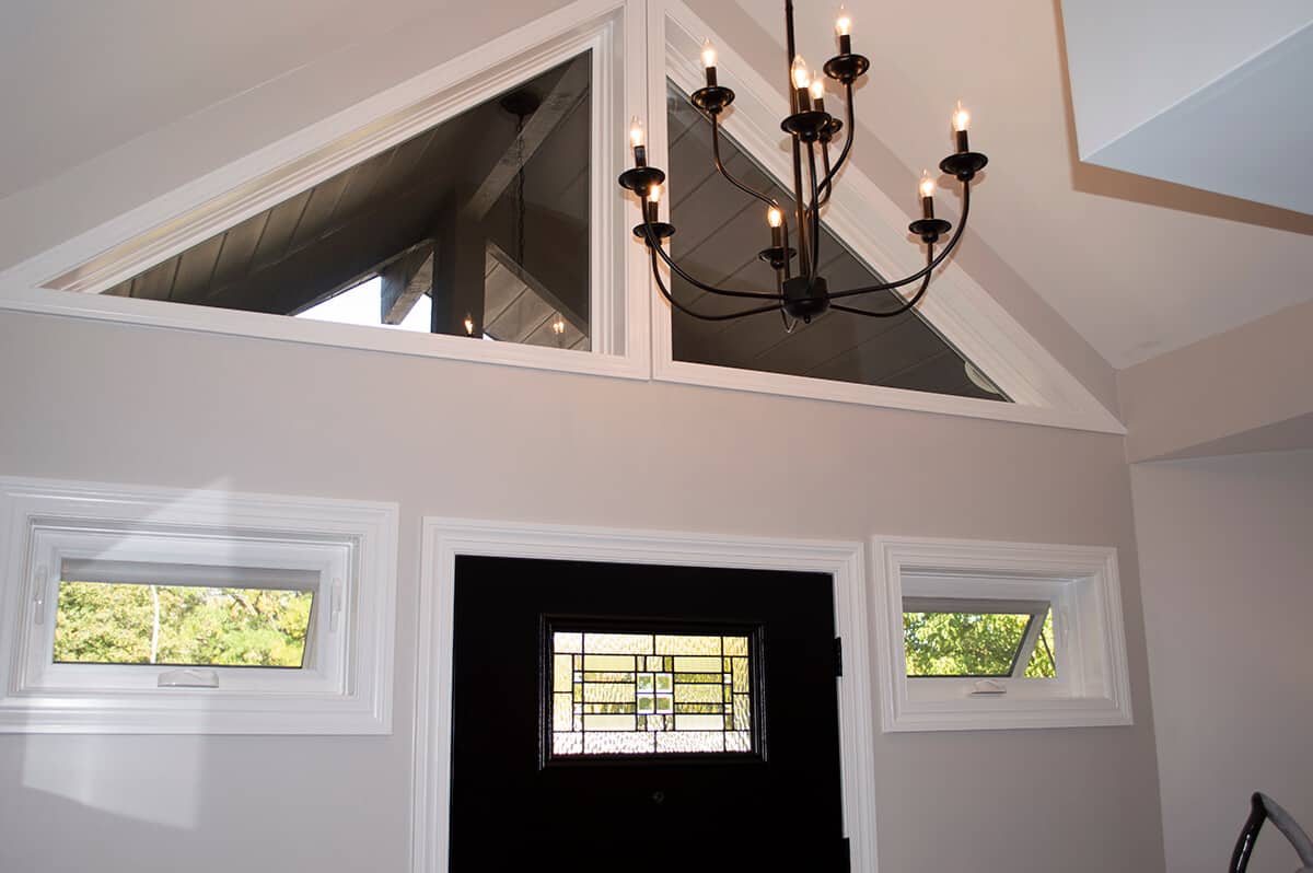SoftLite shaped picture windows installed above an entry door