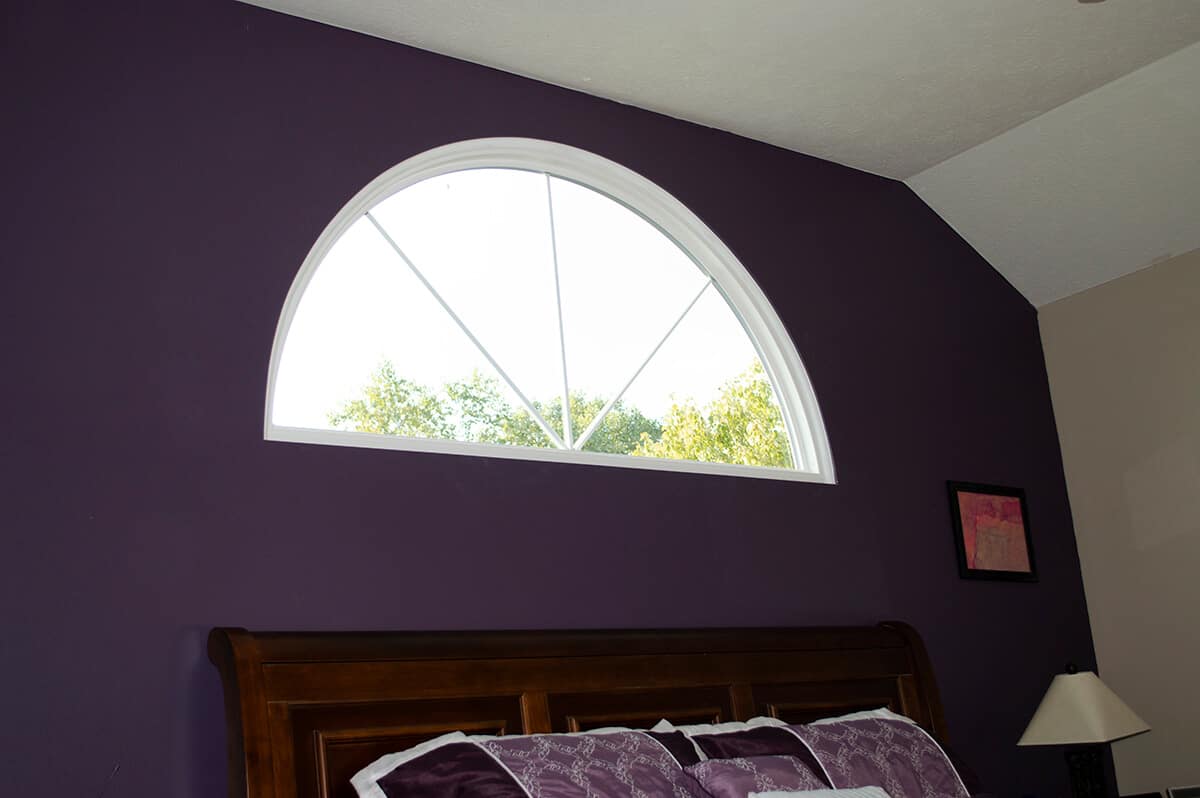 Interior view of a SoftLite picture window installed in a bedroom