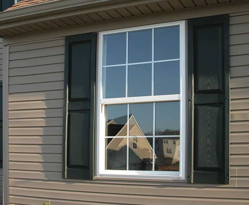 Exterior view of a SoftLite single hung window in a home