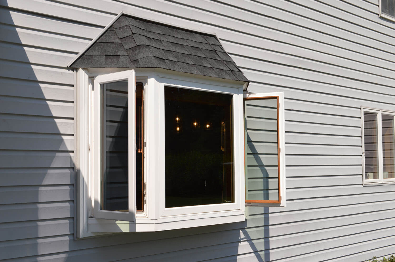 Exterior view of a bay window with the sides open
